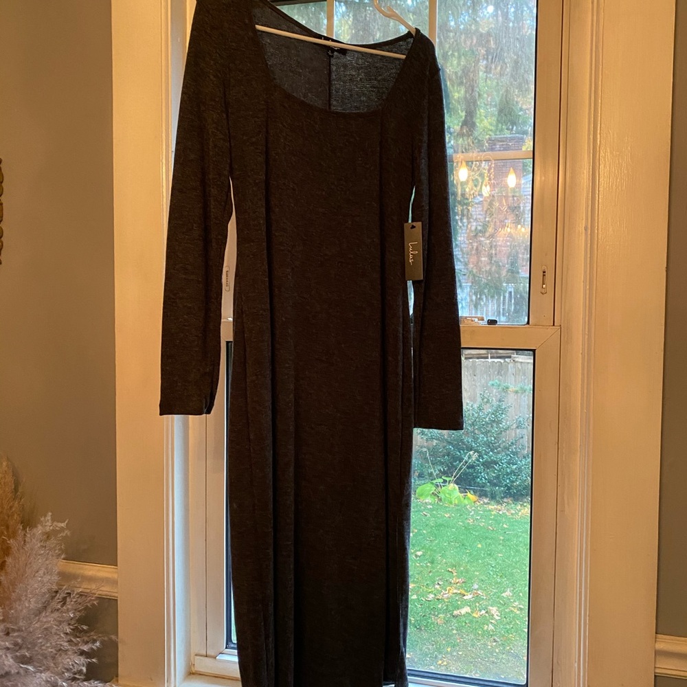 Never worn. New with tags. Size large Lulu’s dress